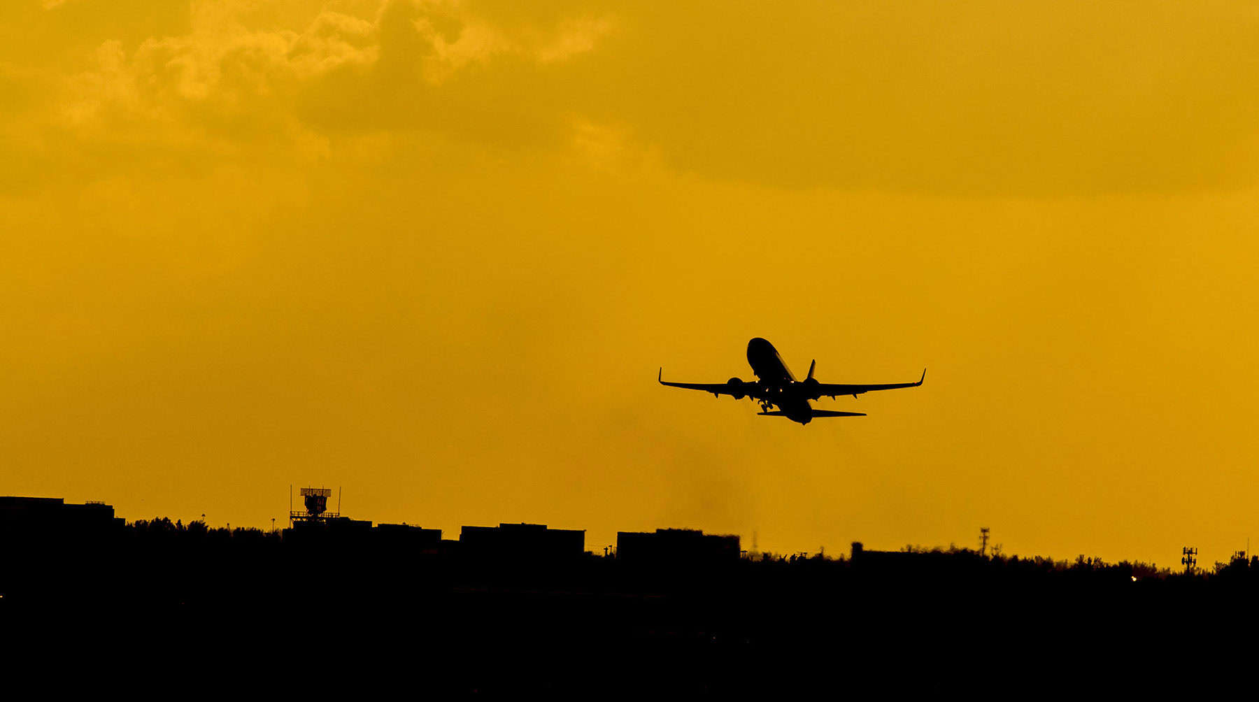 airplane orange sky